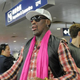 Dennis Rodman prepares to check in for his flight to North Korea at Beijing's international airport on Jan. 6, 2014.
WANG ZHAO/AFP/Getty Images